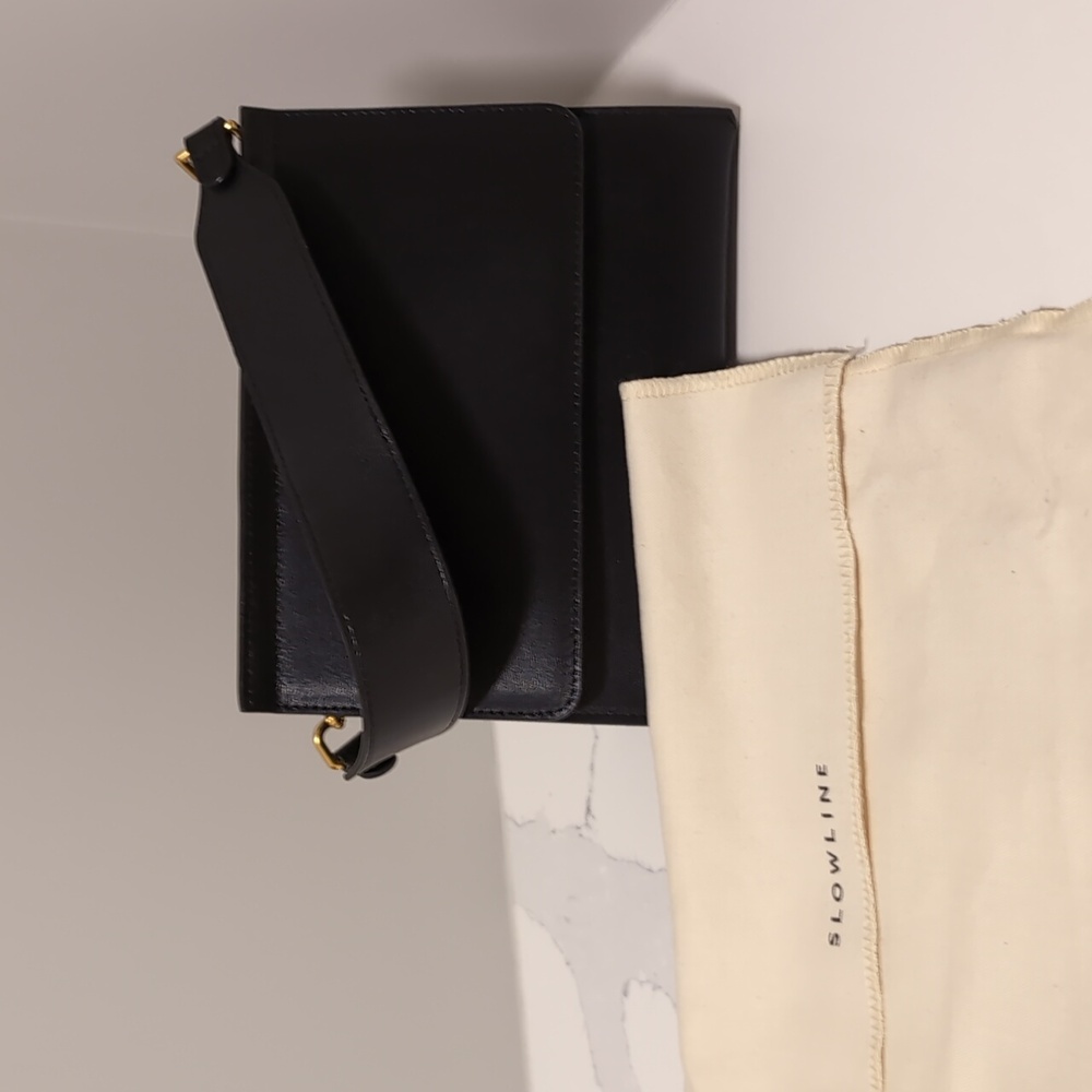 Slowline black leather handbag with dust bag